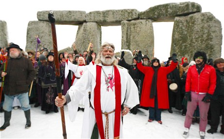 Druids, lead by Arthur Pendragon (centre), take part in the winter solstice at Stonehenge in Wiltshire