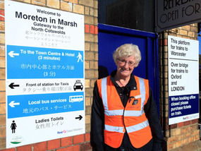 Station manager Teresa Ceesay with one of the signs in Japanese yesterday. 